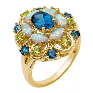 Gold cocktail ring with blue topaz and opal
